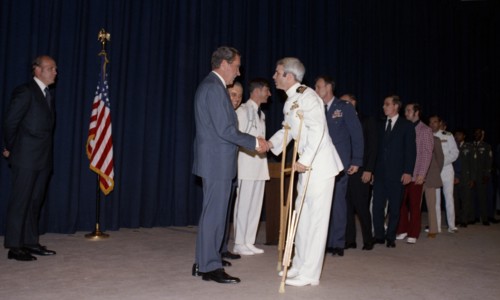 John McCain greeted by Richard Nixon.