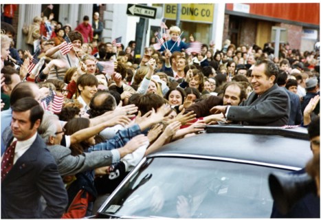 President Richard Nixon Smiles as Members of the Crowd Reach out