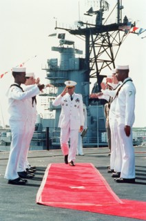 Sideboys salute as Gen. Colin L. Powell