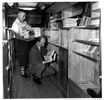 Returning Books to their Places Inside the Bookmobile