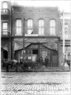 Carriage in front of African American Hotel