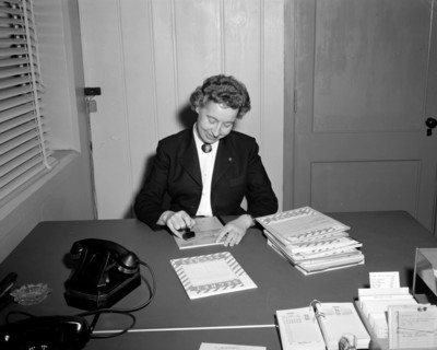 1960s female worker at desk