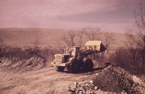 A Bulldozer Prepares A Path for One of the Huge Coal Shovels