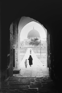 Temple area, Mosque of Omar [i.e., Dome of the Rock], etc. Mosque of Omar from the north, woman and daughter walking to the mosque. ca. 1900