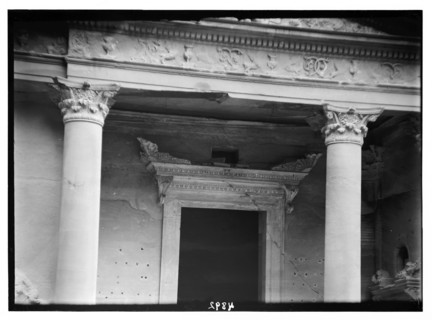 Elaborate consoled cornice. Above lintel of main doorway in Petra, El-Khazneh ca. 1920