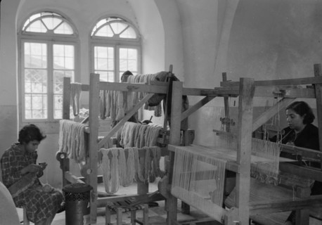 Women's Institute, Jerusalem. One of the weaving rooms, women working on looms ca. between 1934 and 1939