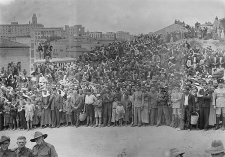 Arab recruits on parade in Jerusalem. Crowd of spectators. Arabs gathering watching parade ca. 1941
