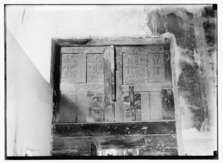 Carved ornaments of the wooden door at the Church of the Nativity ca. 1900
