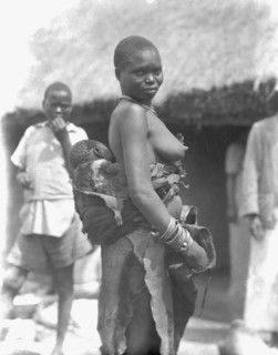 1930s Uganda Woman carrying child ca. 1936