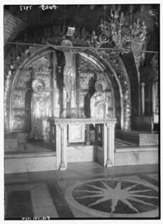 Interior of the Church of the Holy Sepulchre. Calvary altar with candles and decoration removed ca. 1934
