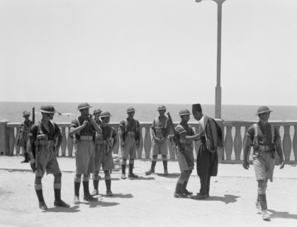 Palestine disturbances 1936: Along the sea front of Jaffa, Palestinian citizens being searched by soldiers ca. 1936