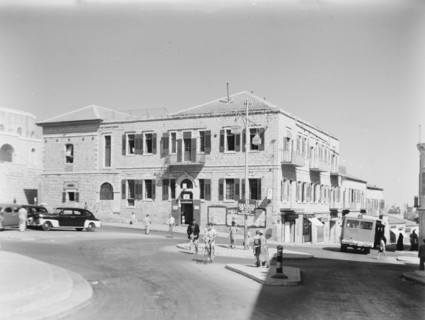 YMCA Hostel, old post office building, pedestrians and auto traffic in Jerusalem ca. between 1920 and 1946