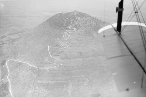 Aerial view of zig-zag motor road up a mountain in Israel (probably Mt. Tabor) ca. 1937