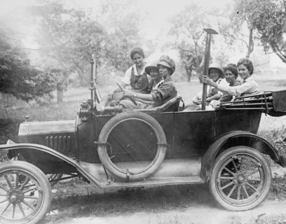 Women riding in an automobile ca.  between 1910 and 1920