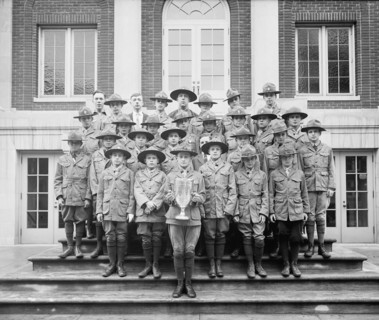 Boy Scouts group photo, standing with a trophy ca.  between 1910 and 1925