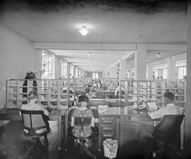 Workers processing soldier's bonus ca.  between 1910 and 1935
