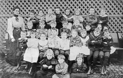 Miss Dyer school group, children group photo, arms crossed ca.  between 1910 and 1935