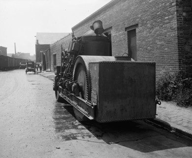 Equipment of the Crawford Paving Company, paving a road ca.  between 1910 and 1925