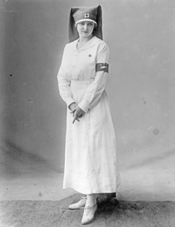 American Red Cross uniform modeled by a Red Cross nurse. ca.  between 1910 and 1920