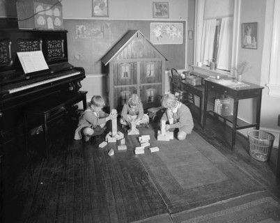Mrs. Tomlin's school, young children playing with blocks ca.  between 1910 and 1920