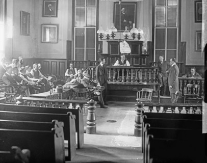 Interior of a courtroom while a trial is in session ca.  between 1910 and 1926