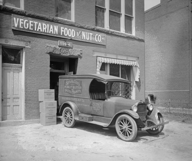 Semmes Motor Company Schindler's Peanut Butter truck parked in front of the Vegetarian Food and Nut Company ca.  between 1910 and 1926