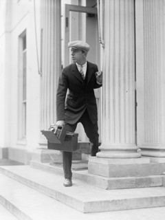 Unidentified photographer with camera ca. between 1909 and 1923