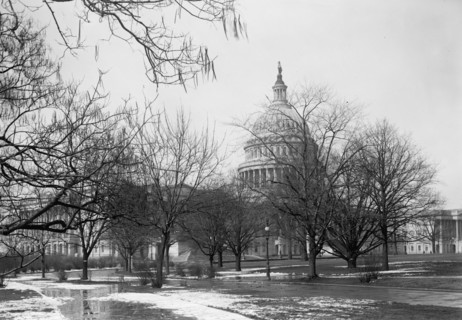 Melting snow outside the U.S. Capitol ca. between 1909 and 1923