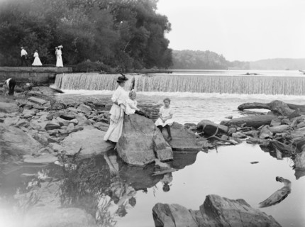 Woman and her children at Great Falls, possibly on the Potomoc River ca. between 1909 and 1923