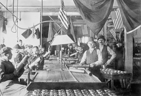 Men inspecting cartridge cases  ca. between 1909 and 1920