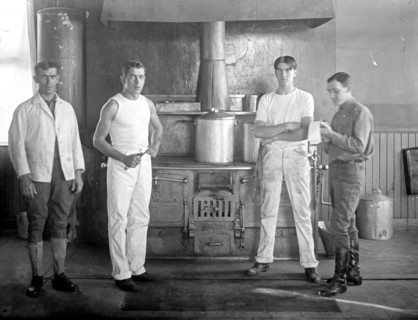 U.S. Army cooks in a kitchen ca. between 1909 and 1940