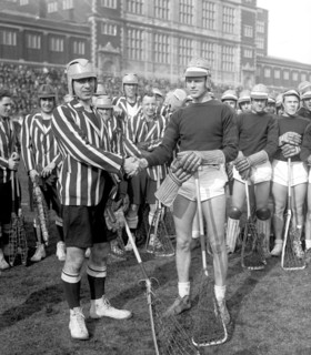 Rival men's lacrosse players shaking hands ca. between 1909 and 1923
