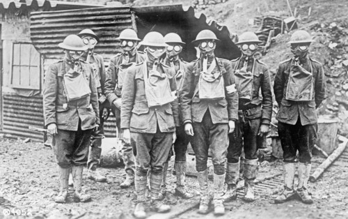 Soldiers wearing gas masks ca. between 1909 and 1920