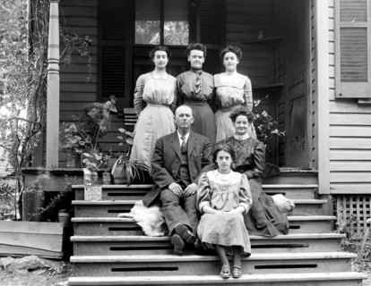 Family photo on the steps of a house in Vienna VA ca. between 1909 and 1923