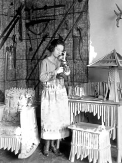 C&P Telephone Company girl using a telephone ca. between 1909 and 1940