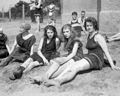 Young women or teen girls in swim suits on a bathing beach ca. between 1909 and 1932