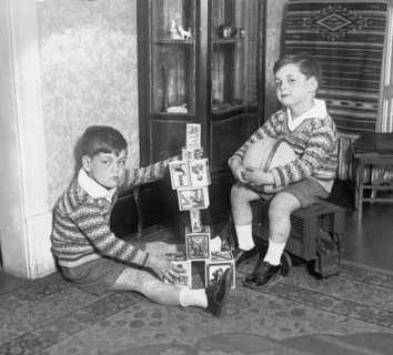 Two boys playing with blocks ca. between 1909 and 1923
