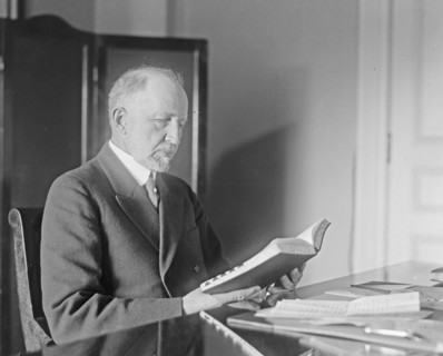 Speaker of the House Frederick Gillett reading a book ca.  between 1918 and 1920