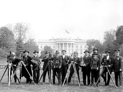 Group of camera men in front of the White House ca.  between 1918 and 1928