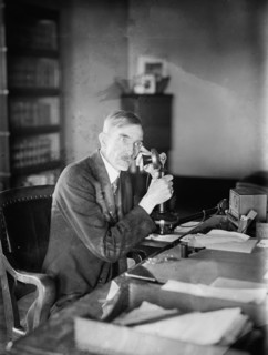 Man talking on a telephone, early 20th century ca.  between 1918 and 1920