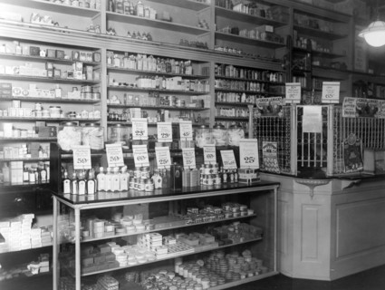 Interior of People's Drug Store, No. 9, 31st and M Streets, Washington, D.C., with products in display cases and on shelves ca. between 1909 and 1932