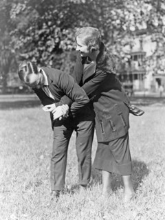 Policewoman and policeman practicing self-defense ca. 1909