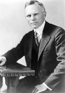 Frederick J. Libby, three-quarter length portrait, seated, facing slightly left ca. 1909