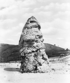 Liberty Cap at Mammoth Hot Springs, Yellowstone National Park, Wyoming, reached by the Northern Pacific Railway via Gardiner Gateway ca. 1909