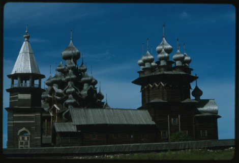 Pogost ensemble, Church of the Intercession (1764), (right); with bell tower (19th century); and Church of the Transfiguration (1714), south view, Kizhi Island, Russia; 1993