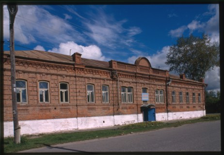 Brick commercial building, Sacco and Vanzetti Street #1 (late 19th century), Tobol'sk, Russia 1999.