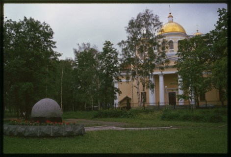 Cathedral of St. Alexander Nevsky (1826-32), north facade, with Monument to Victims of Chernobyl (1998), Petrozavodsk, Russia; 2000