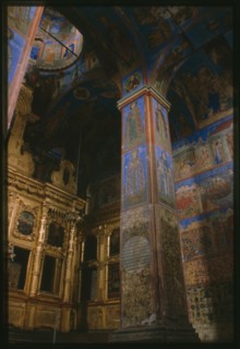 Church of Saint Nicholas Nadein (1620-22), interior, southeast corner, with icon screen and frescoes of scenes from the life of Saint Nicholas, Yaroslavl', Russia; 1997