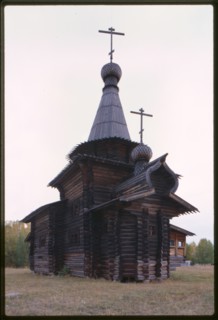 Log Church of the Savior from the village of Zashiversk (1700), southeast view, moved and reassembled in the Outdoor Architecture and History Museum at Akademgorodok, Russia; 1999