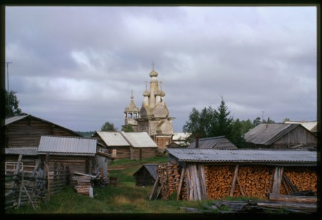 Church of the Hodigitria Icon of the Virgin (1763), southeast panorama with village houses, Kimzha, Russia; 2000
